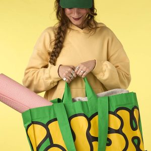 2_green_and_yellow_big_bag_lifestyle_hero_2025_5_4841b220_thumbnail_4096-1.jpg