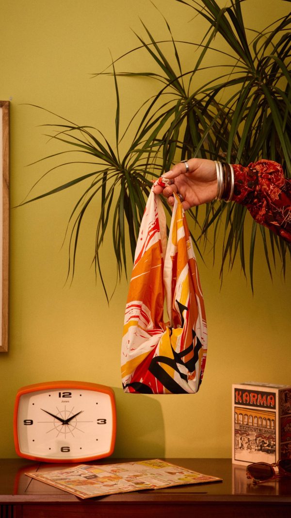 Karma Knot Wrap 100% organic cotton, a 70cm x 70cm Knot Wrap